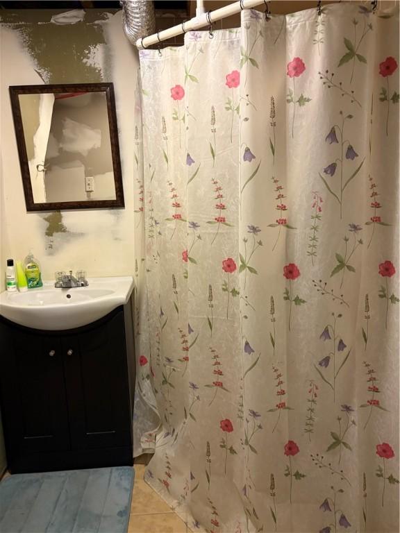 15 Villa Ave, Cranston, RI 02905 - full bathroom with vanity, tile patterned floors, and a shower with curtain