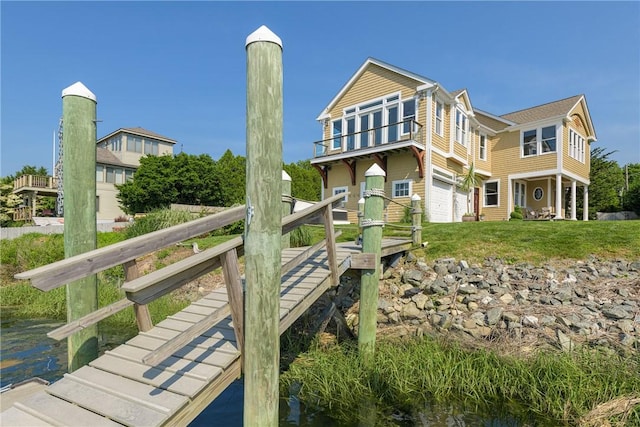 137 Congdon Ave, North Kingstown, RI 02852 - rear view of house with an attached garage