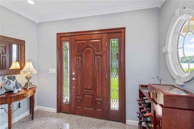 137 Congdon Ave, North Kingstown, RI 02852 - entrance foyer featuring healthy amount of natural light, ornamental molding, and recessed lighting