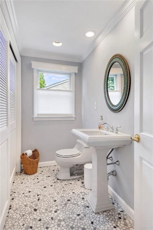 137 Congdon Ave, North Kingstown, RI 02852 - half bath featuring ornamental molding, a closet, and recessed lighting