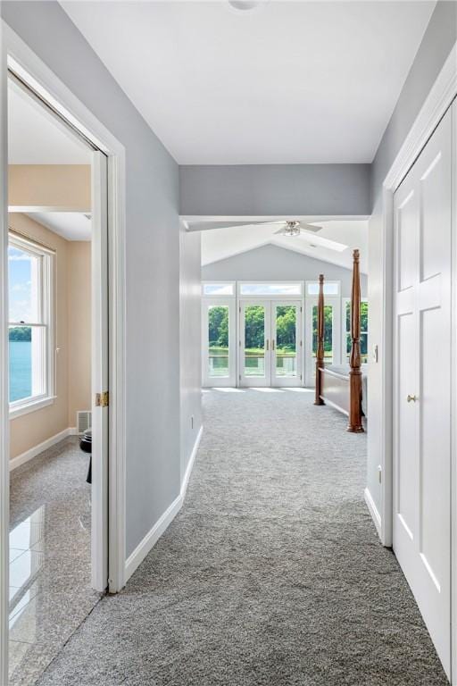 137 Congdon Ave, North Kingstown, RI 02852 - hallway with french doors and carpet floors