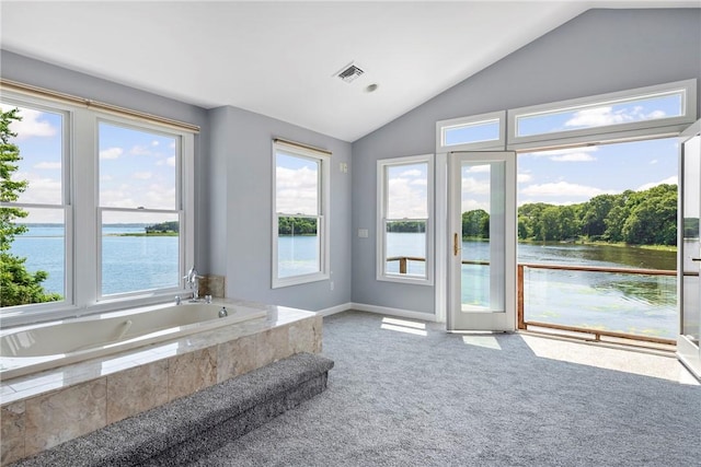 137 Congdon Ave, North Kingstown, RI 02852 - full bath with a water view, vaulted ceiling, plenty of natural light, and a garden tub