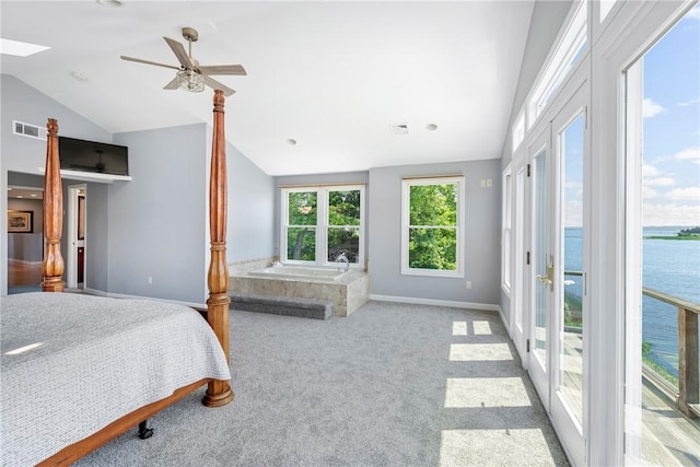 137 Congdon Ave, North Kingstown, RI 02852 - carpeted bedroom with lofted ceiling, access to outside, a water view, ceiling fan, and a skylight