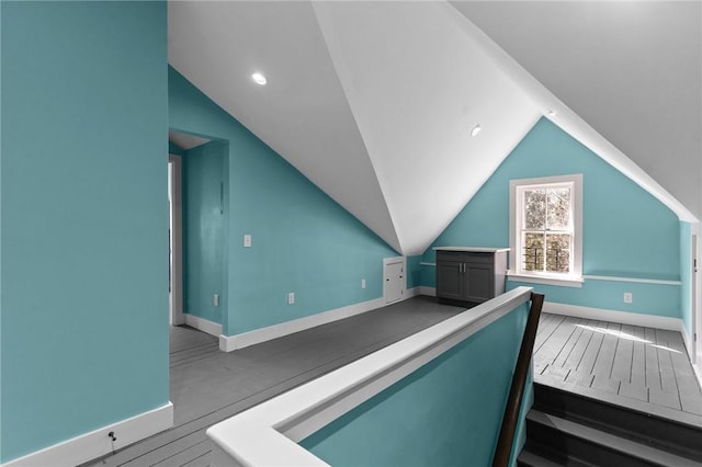 81 Old N Rd, South Kingstown, RI 02881 - stairway with baseboards, vaulted ceiling, and recessed lighting