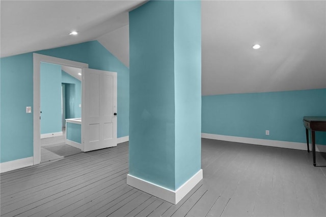 81 Old N Rd, South Kingstown, RI 02881 - additional living space with wood finished floors, baseboards, lofted ceiling, and recessed lighting