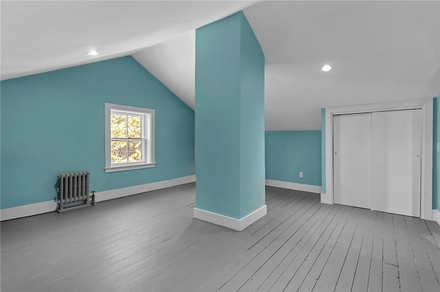 81 Old N Rd, South Kingstown, RI 02881 - bonus room with radiator, wood finished floors, baseboards, vaulted ceiling, and recessed lighting