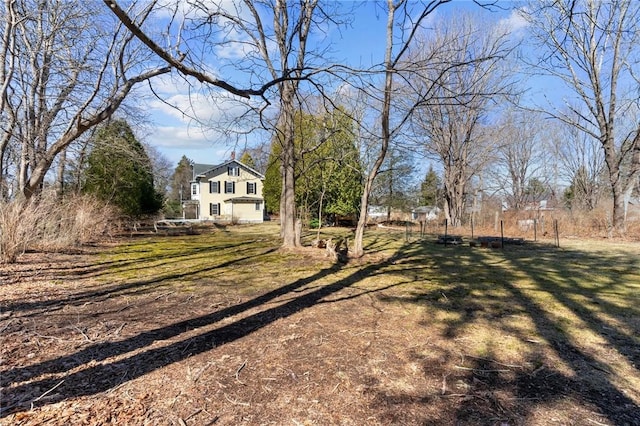 81 Old N Rd, South Kingstown, RI 02881 - view of green lawn with an attached garage