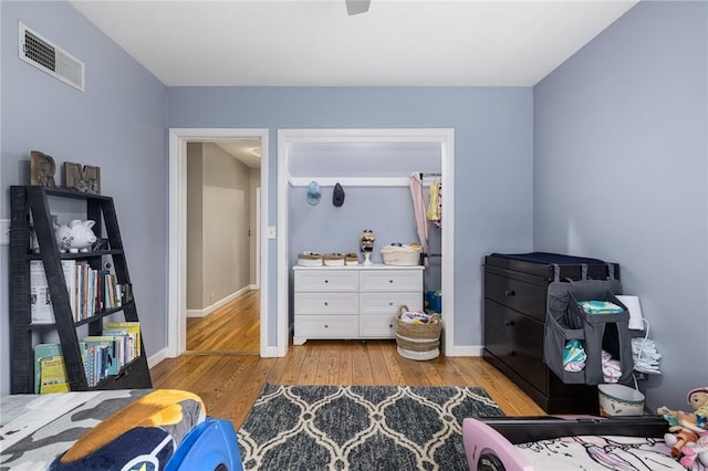 14 Twin Oak Dr, Warwick, RI 02889 - bedroom with light wood-style flooring and baseboards