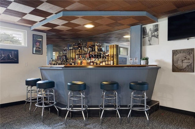 14 Twin Oak Dr, Warwick, RI 02889 - indoor dry bar with baseboards and carpet
