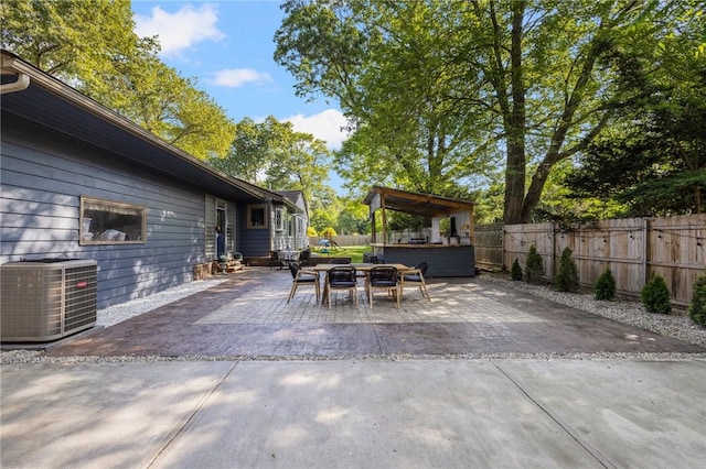 14 Twin Oak Dr, Warwick, RI 02889 - fenced backyard with a patio and a fire pit