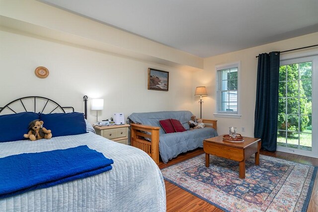 223 Corey Ln, Middletown, RI 02842 - bedroom featuring wood finished floors and access to exterior