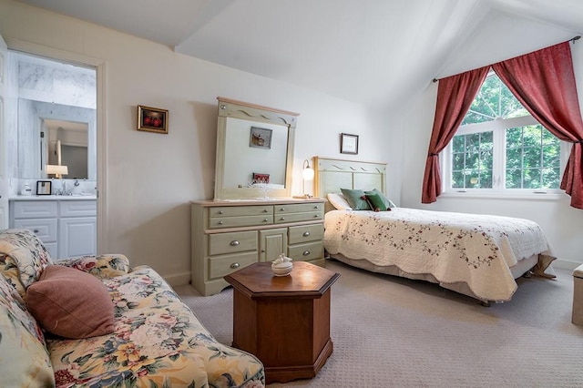 223 Corey Ln, Middletown, RI 02842 - bedroom featuring light colored carpet, lofted ceiling, and ensuite bathroom