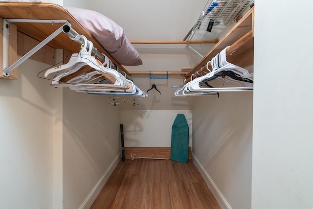 223 Corey Ln, Middletown, RI 02842 - spacious closet featuring wood finished floors