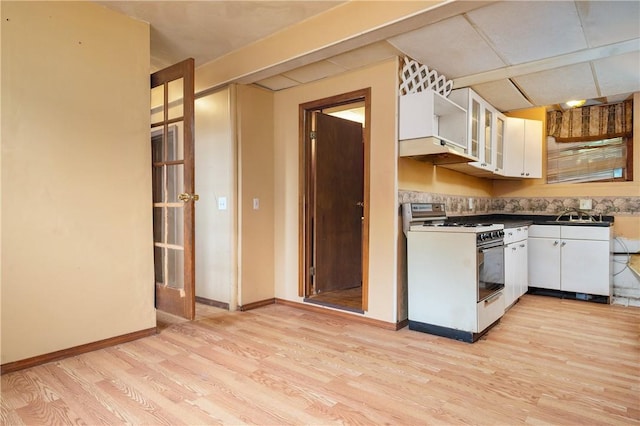 21 Diana Ave, Smithfield, RI 02917 - kitchen with white gas stove, white cabinetry, light wood finished floors, glass insert cabinets, and baseboards