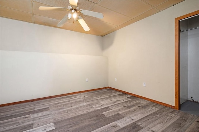 21 Diana Ave, Smithfield, RI 02917 - unfurnished bedroom with wood finished floors, ceiling fan, and baseboards