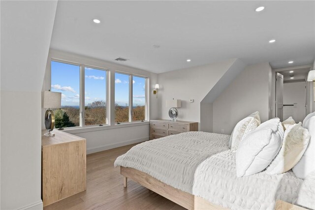 8 J H Dwyer Dr, Middletown, RI 02842 - bedroom with light wood-style floors, baseboards, and recessed lighting