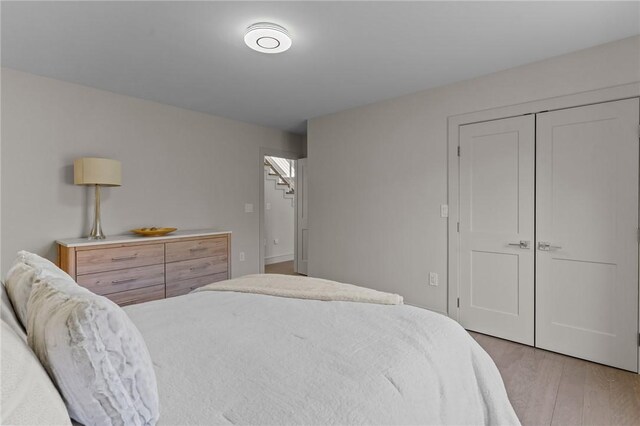 8 J H Dwyer Dr, Middletown, RI 02842 - bedroom featuring light wood-style floors and a closet