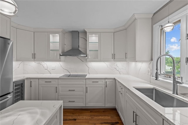 2 Tamarac Dr Unit A, Smithfield, RI 02828 - kitchen featuring wall chimney exhaust hood, a sink, black electric cooktop, freestanding refrigerator, and dark wood finished floors