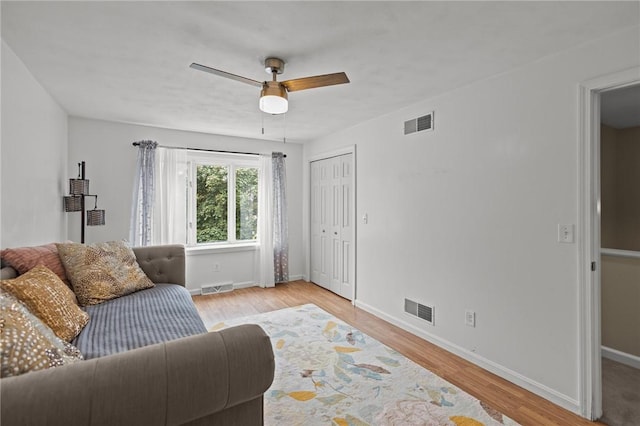 2 Tamarac Dr Unit A, Smithfield, RI 02828 - living room with wood finished floors, baseboards, and ceiling fan