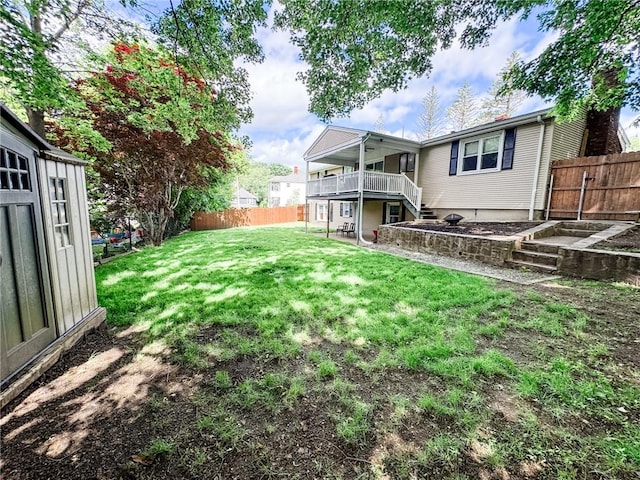1 Sharp St, Coventry, RI 02816 - fenced backyard featuring a wooden deck and stairway