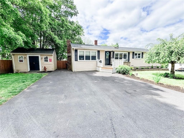 1 Sharp St, Coventry, RI 02816 - ranch-style house with a chimney, an outbuilding, and driveway