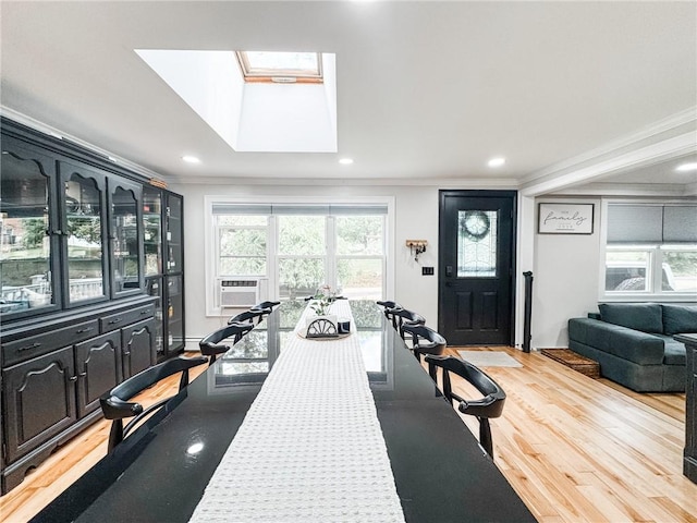 1 Sharp St, Coventry, RI 02816 - dining room with crown molding, cooling unit, light wood-style floors, a skylight, and recessed lighting