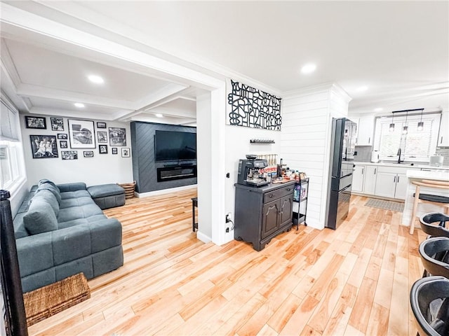 1 Sharp St, Coventry, RI 02816 - living room with recessed lighting, light wood-style flooring, beamed ceiling, coffered ceiling, and ornamental molding