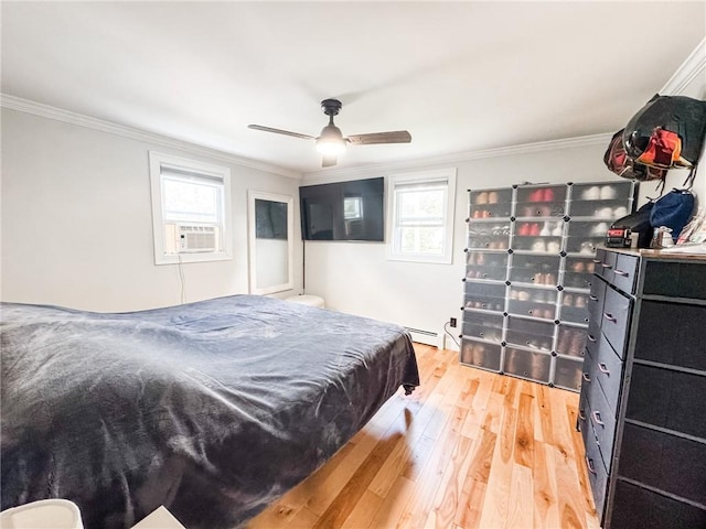1 Sharp St, Coventry, RI 02816 - bedroom with cooling unit, crown molding, light wood finished floors, a baseboard radiator, and a ceiling fan