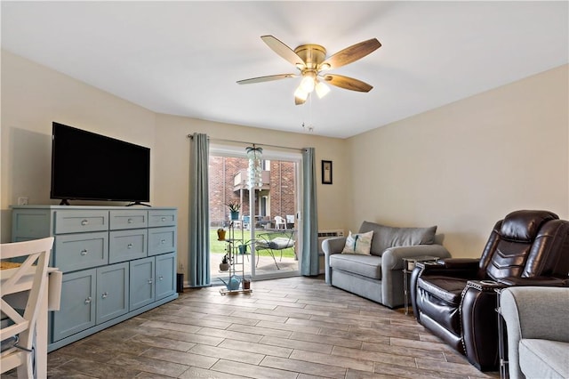 3940 Post Rd Unit 30, Warwick, RI 02886 - living area with a ceiling fan and wood finished floors