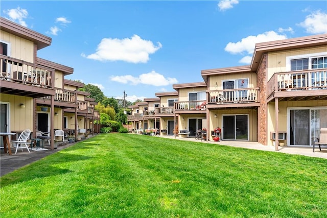 3940 Post Rd Unit 30, Warwick, RI 02886 - view of green lawn with a patio area