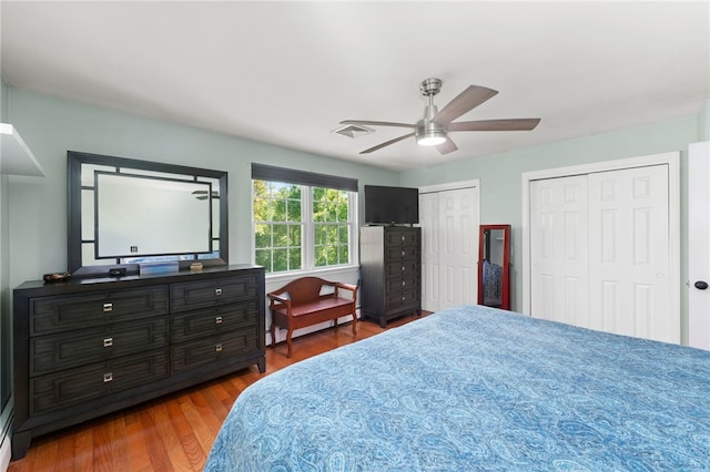 99 Post Rd Unit F1, Warwick, RI 02888 - bedroom with wood finished floors, multiple closets, and a ceiling fan
