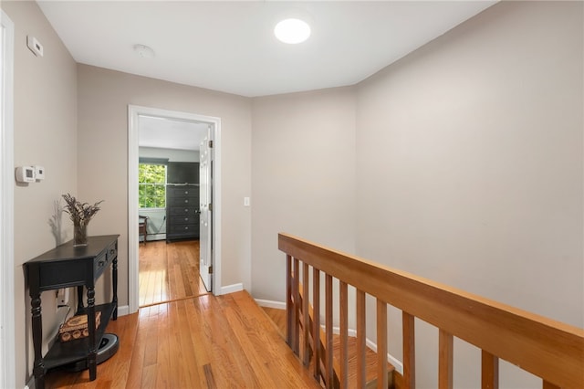 99 Post Rd Unit F1, Warwick, RI 02888 - hallway featuring light wood finished floors, an upstairs landing, and baseboards