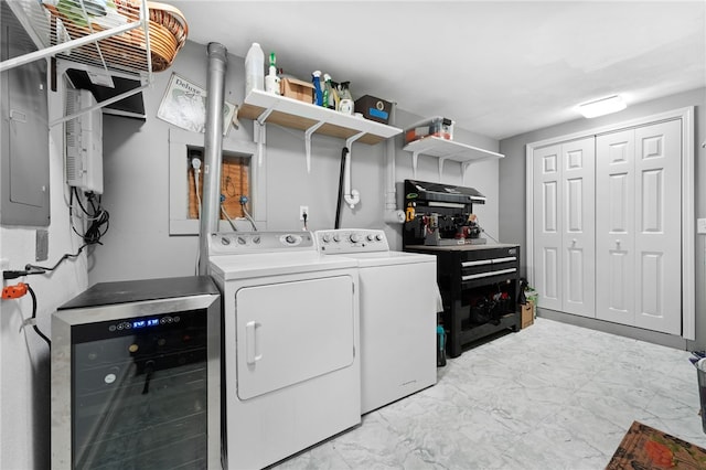99 Post Rd Unit F1, Warwick, RI 02888 - washroom featuring washer and clothes dryer and light marble finish floors