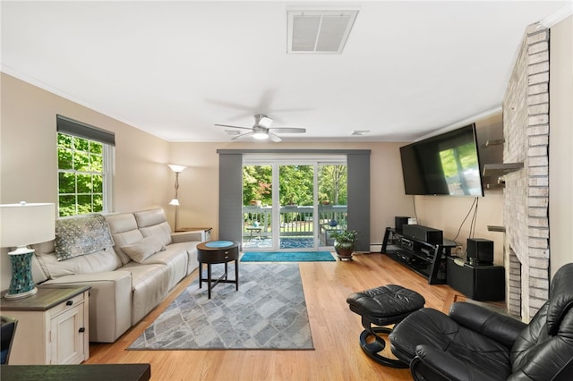 99 Post Rd Unit F1, Warwick, RI 02888 - living room with ceiling fan, light wood finished floors, and crown molding