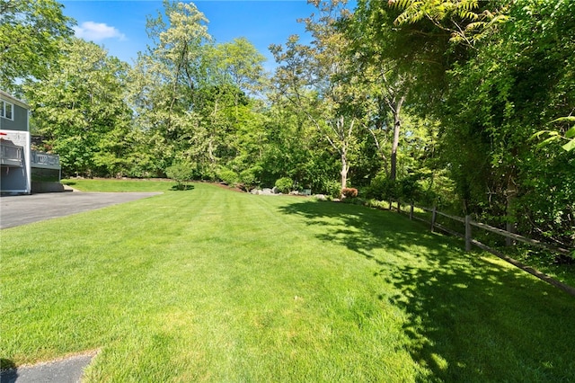 99 Post Rd Unit F1, Warwick, RI 02888 - view of green lawn featuring asphalt driveway
