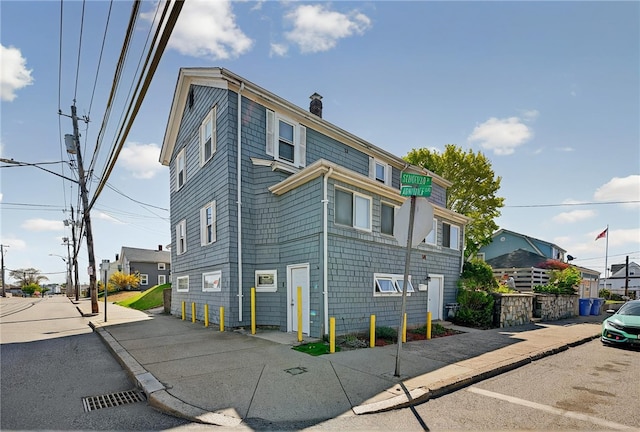 179 Armistice Blvd, Pawtucket, RI 02860 - view of front facade featuring a chimney