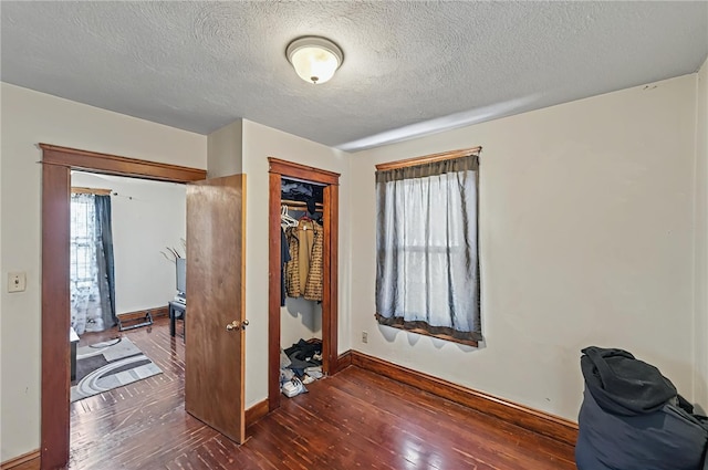 179 Armistice Blvd, Pawtucket, RI 02860 - office area with hardwood / wood-style flooring, a textured ceiling, plenty of natural light, and baseboards