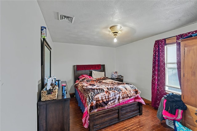 179 Armistice Blvd, Pawtucket, RI 02860 - bedroom with hardwood / wood-style floors and a textured ceiling