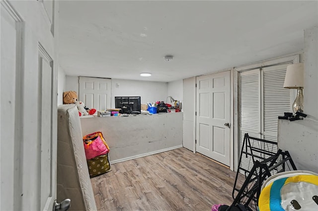 179 Armistice Blvd, Pawtucket, RI 02860 - game room with wood finished floors and baseboards