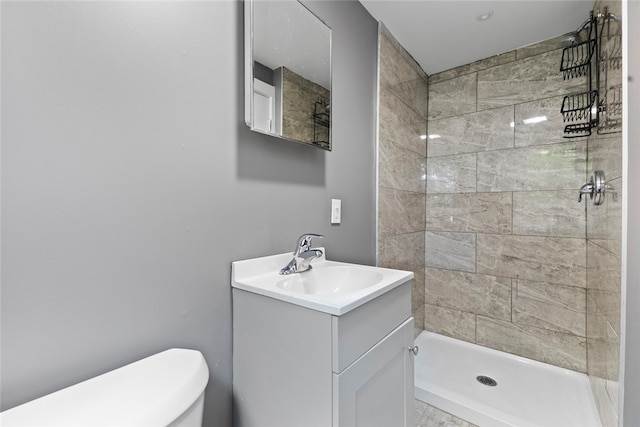 10 Sisson St, West Warwick, RI 02893 - full bath featuring vanity, a tile shower, and toilet