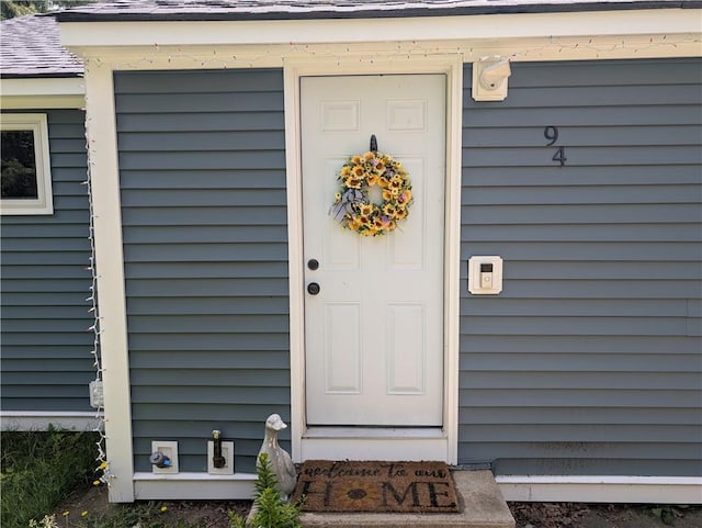 94 Mount Pleasant Rd, North Smithfield, RI 02896 - property entrance with roof with shingles