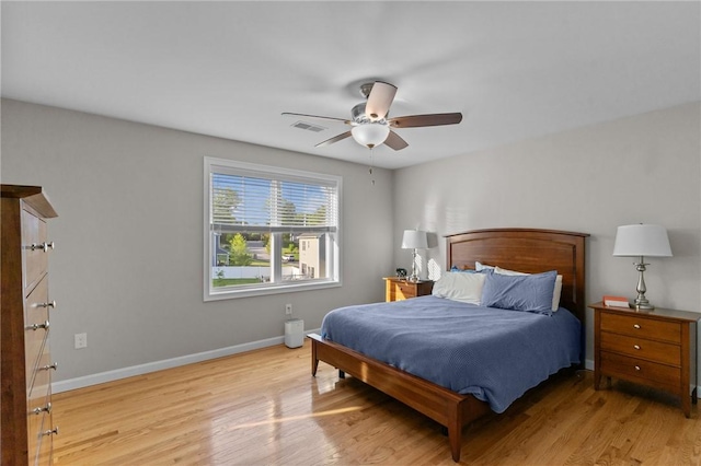 25 Ironwood Dr, Coventry, RI 02816 - bedroom with light wood-style flooring, baseboards, and a ceiling fan