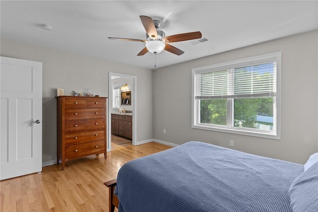 25 Ironwood Dr, Coventry, RI 02816 - bedroom featuring light wood-style floors, baseboards, a ceiling fan, and ensuite bathroom