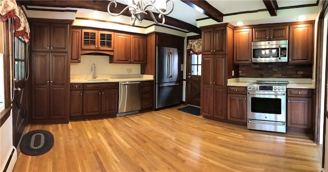 33 Red Gate Rd, Cumberland, RI 02864 - kitchen featuring stainless steel appliances, light countertops, a chandelier, light wood finished floors, and beam ceiling