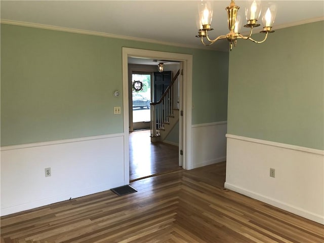 33 Red Gate Rd, Cumberland, RI 02864 - spare room featuring stairway, a chandelier, baseboards, ornamental molding, and wood finished floors