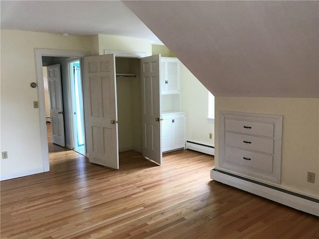 33 Red Gate Rd, Cumberland, RI 02864 - bonus room featuring baseboard heating, light wood finished floors, and baseboards
