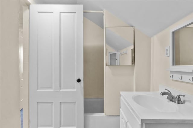 483 Dexter St, Providence, RI 02907 - bathroom with vanity and lofted ceiling