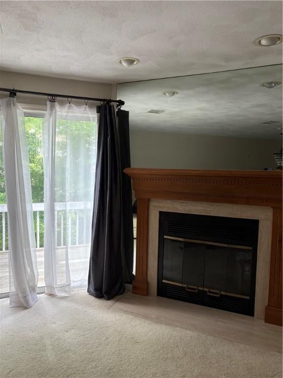37 Trellis Dr Unit 37, West Warwick, RI 02893 - unfurnished living room with a glass covered fireplace