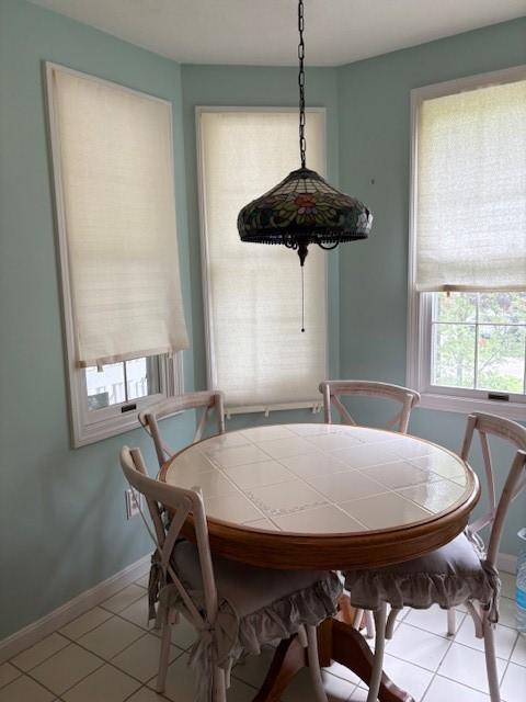 37 Trellis Dr Unit 37, West Warwick, RI 02893 - dining space with tile patterned floors and baseboards