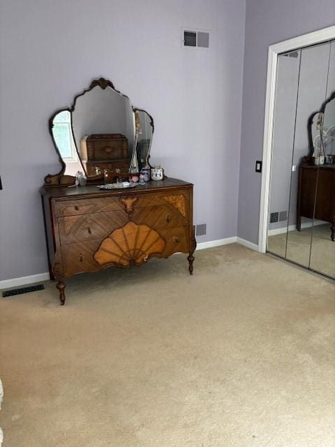 37 Trellis Dr Unit 37, West Warwick, RI 02893 - bedroom featuring light colored carpet, baseboards, and a closet